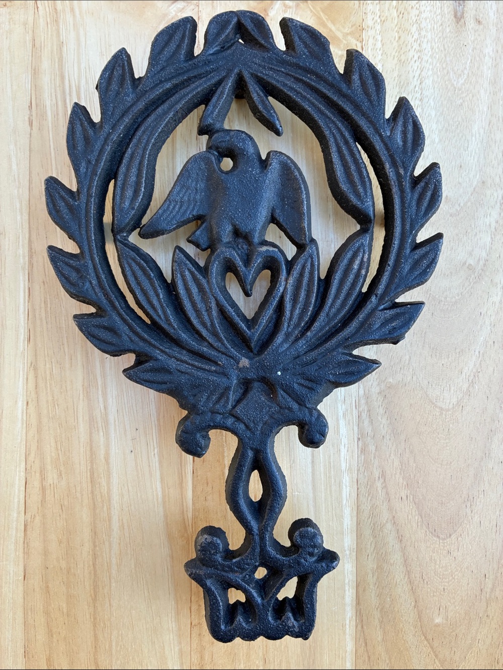 Cast Iron trivet. Eagle. Heart leaves  vintage
